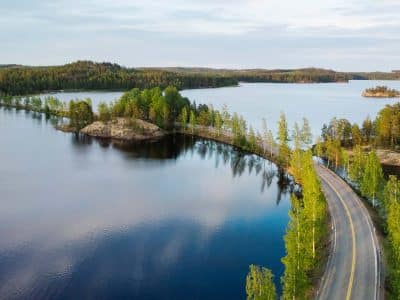 Road-in-the-middle-of-lakes-in-Lakeland-Finland