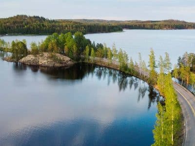 Road-in-the-middle-of-lakes-in-Lakeland-Finland